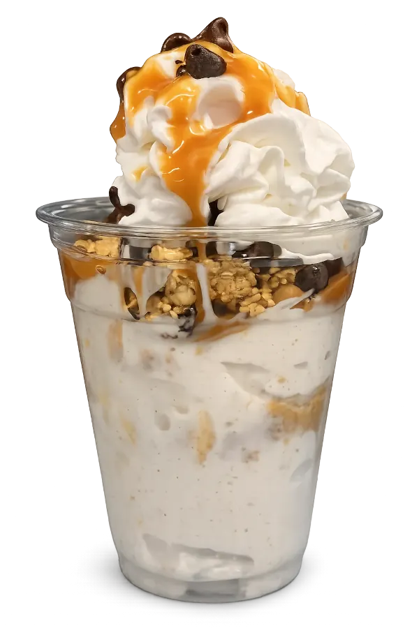 Honey nut yogurt parfait with granola, chocolate chips, whipped cream, and caramel drizzle
