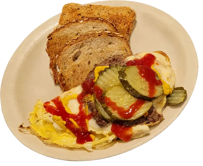 Hamburger omelette with seasoned beef, pickles, ketchup, mustard, and toast