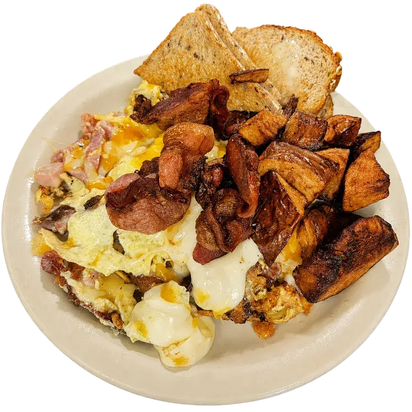 Scrambled eggs with ham, bacon, and melted cheese, served with home fries and toast